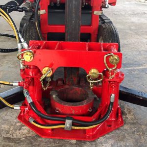 Hydraulic casing jack sits around the foot of the Dando Terrier mast and aids removal of stuck casing